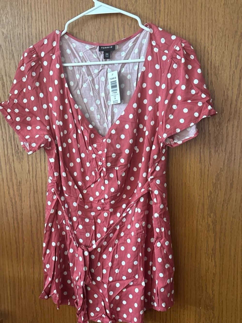 Torrid pink Polka Dot Short Sleeve Wrap shirt